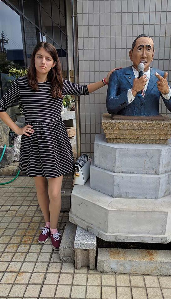 Robin Jungwirth with statue of Barack Obama